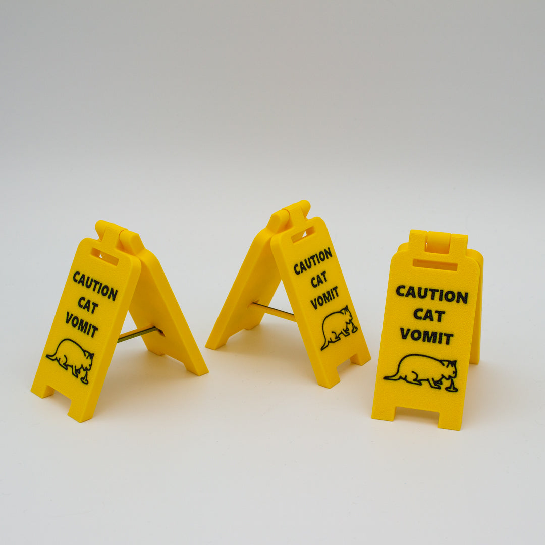 Señal precaución vomito de gato