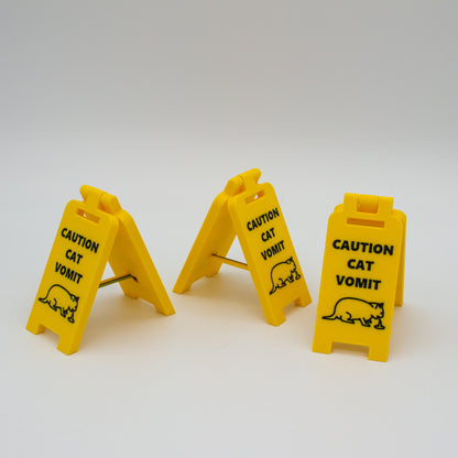 Señal precaución vomito de gato