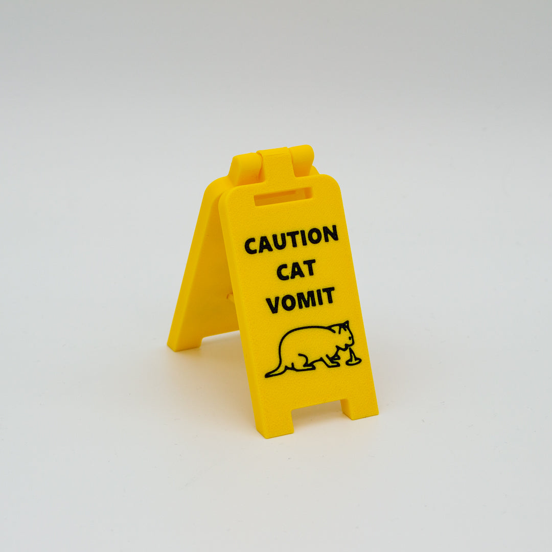 Señal precaución vomito de gato