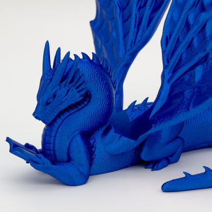 Dragón sujeta libros