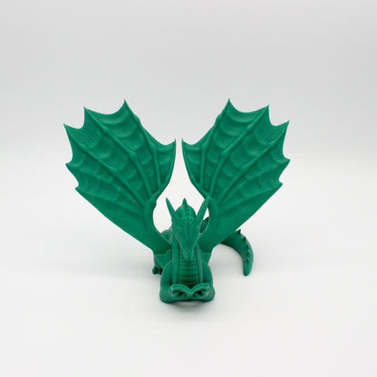 Dragón sujeta libros