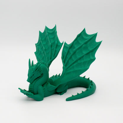 Dragón sujeta libros