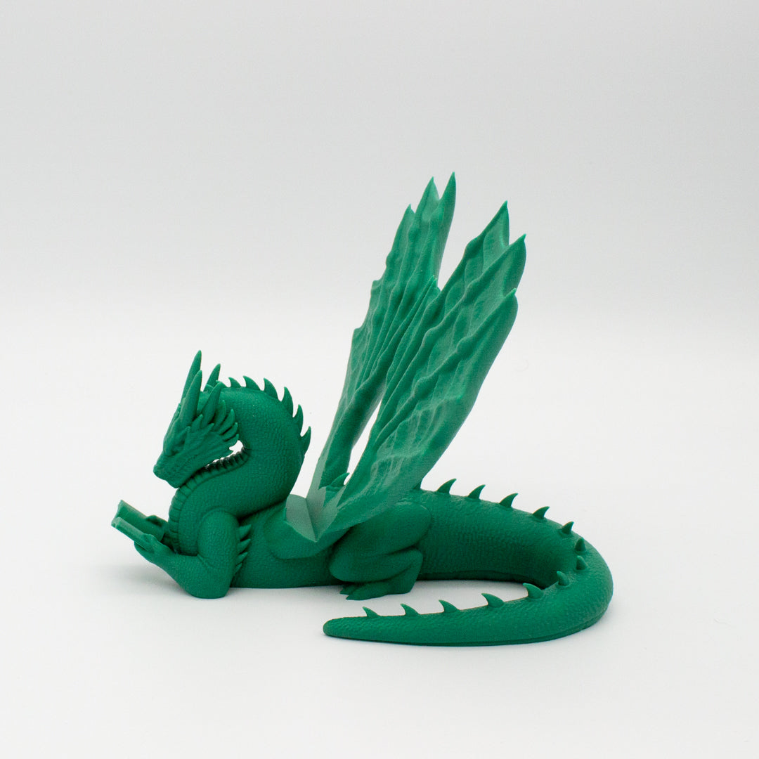 Dragón sujeta libros