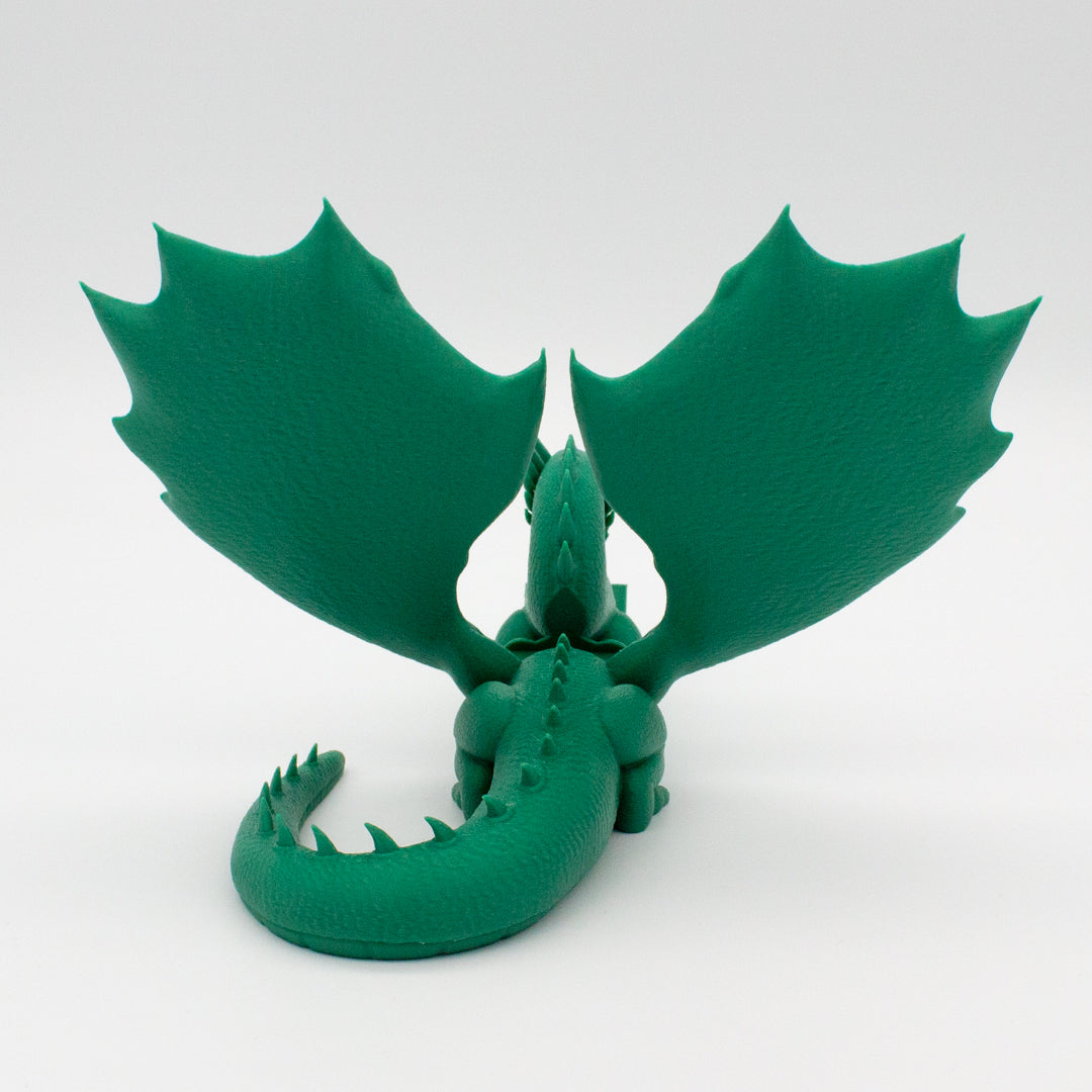 Dragón sujeta libros