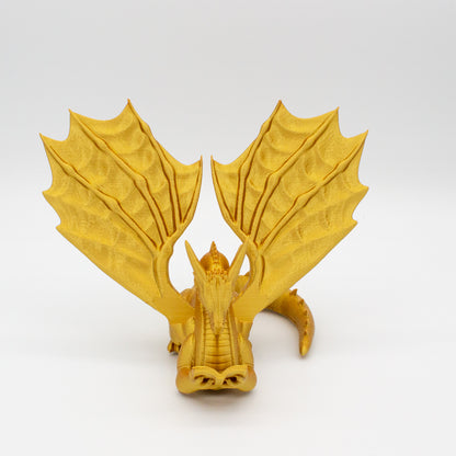 Dragón sujeta libros