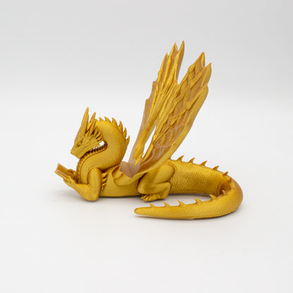 Dragón sujeta libros