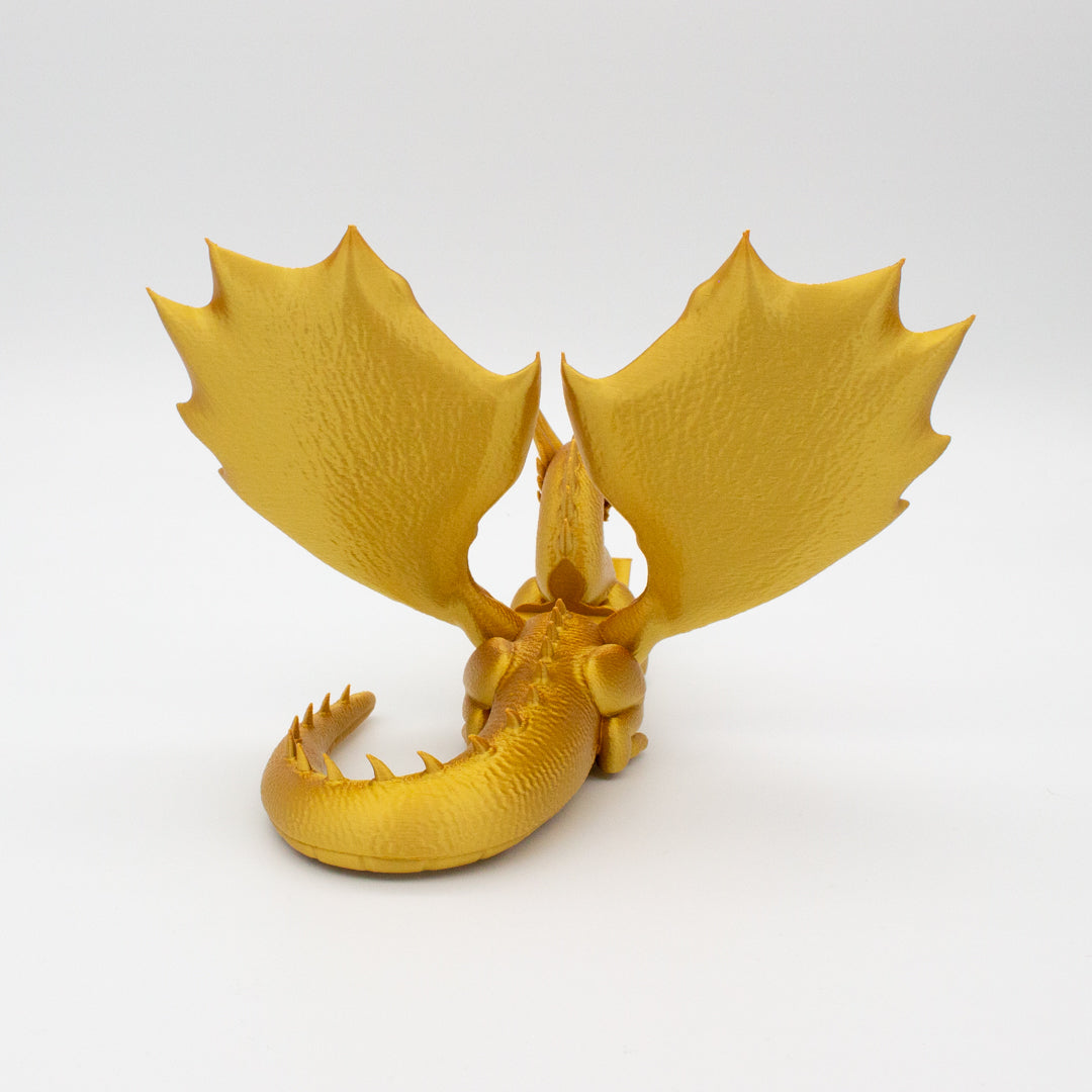 Dragón sujeta libros