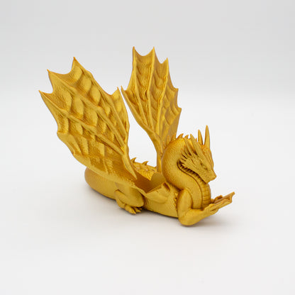 Dragón sujeta libros