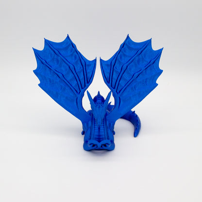 Dragón sujeta libros