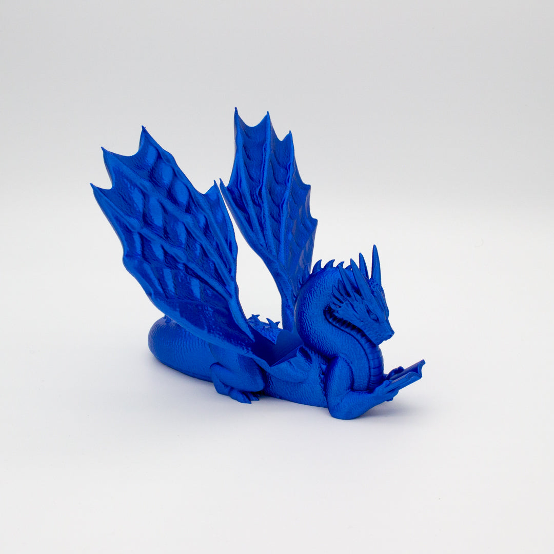 Dragón sujeta libros