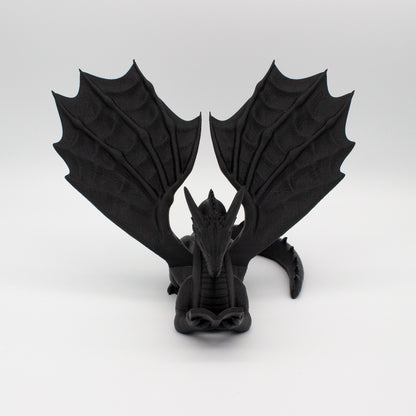 Dragón sujeta libros